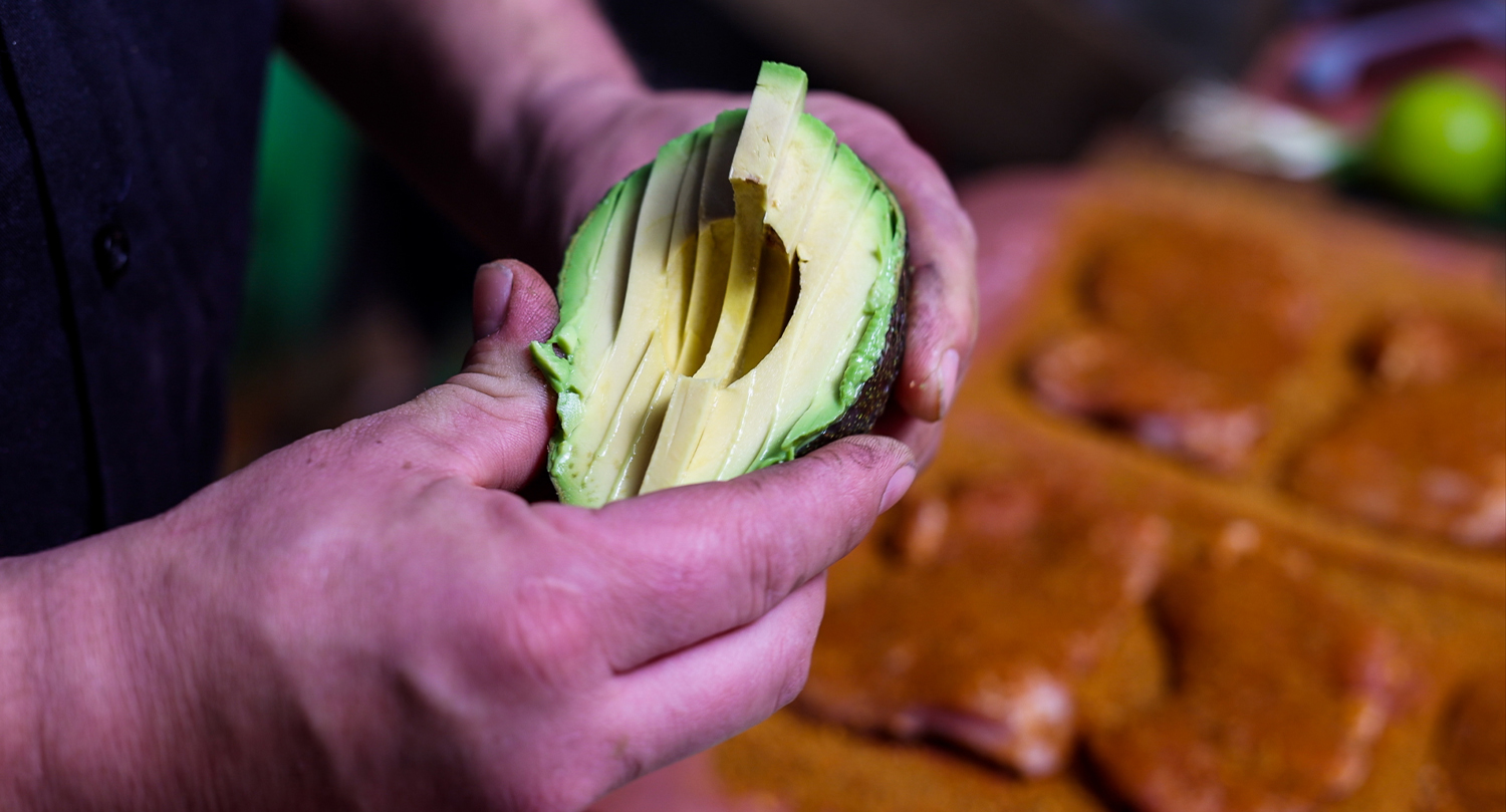 This image shows a sliced avocado