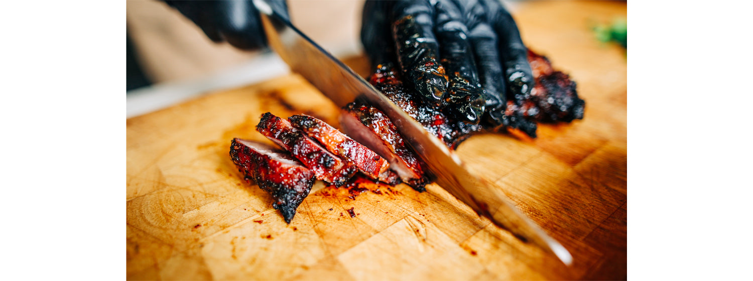 This image shows a sliced grilled pork 