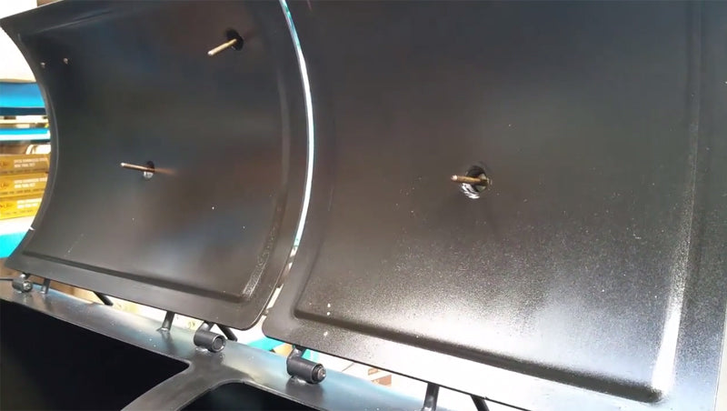 This picture shows the shiny surface of the offset smoker after the seasoning process has been completed