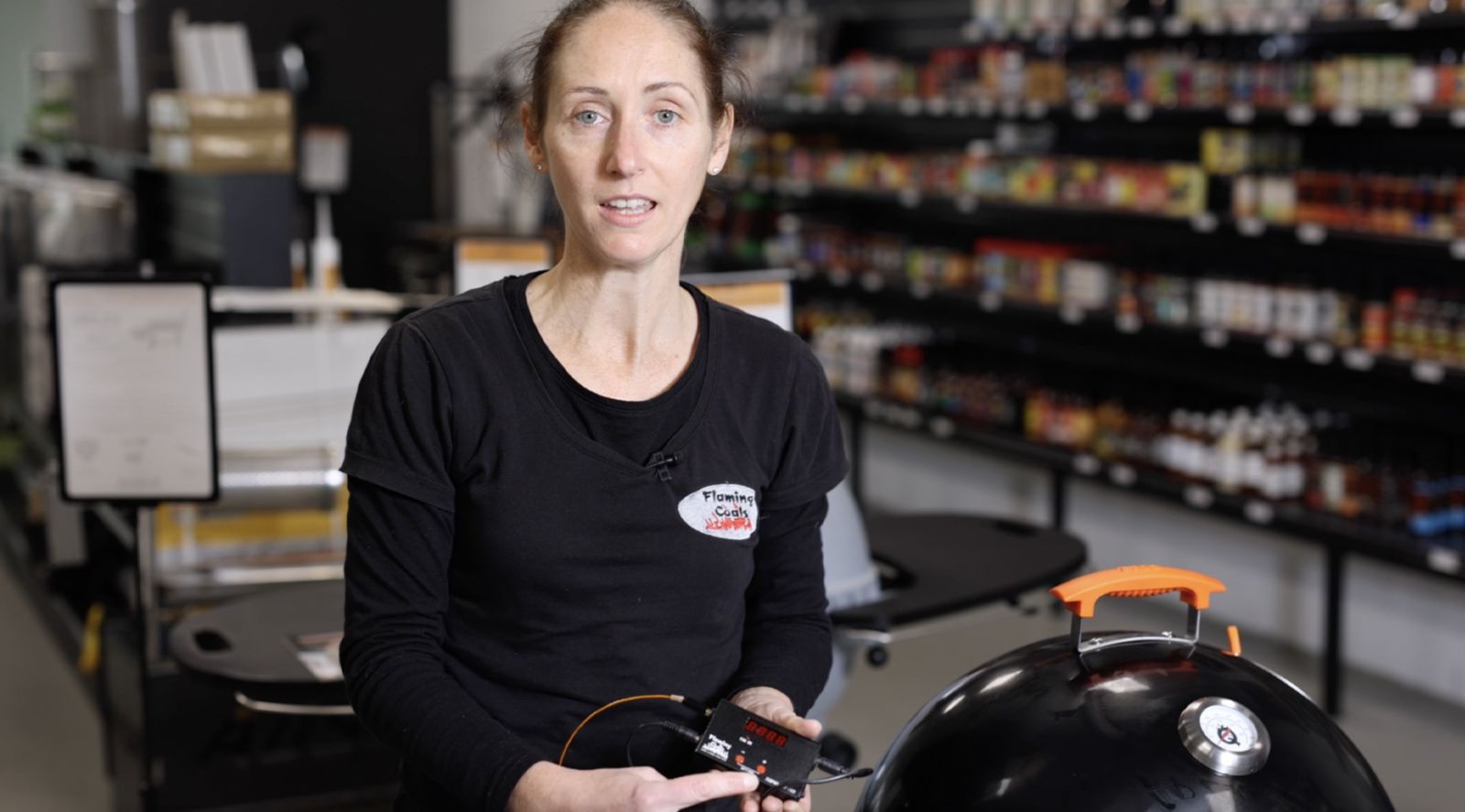 This image shows a woman holding the Temp Master Pro