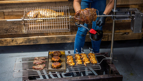 Cooking process basting the Leg of Lamb using Basting Pot and Brush