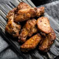 Spit Roasting Chicken Drumettes on Cyprus Grill image
